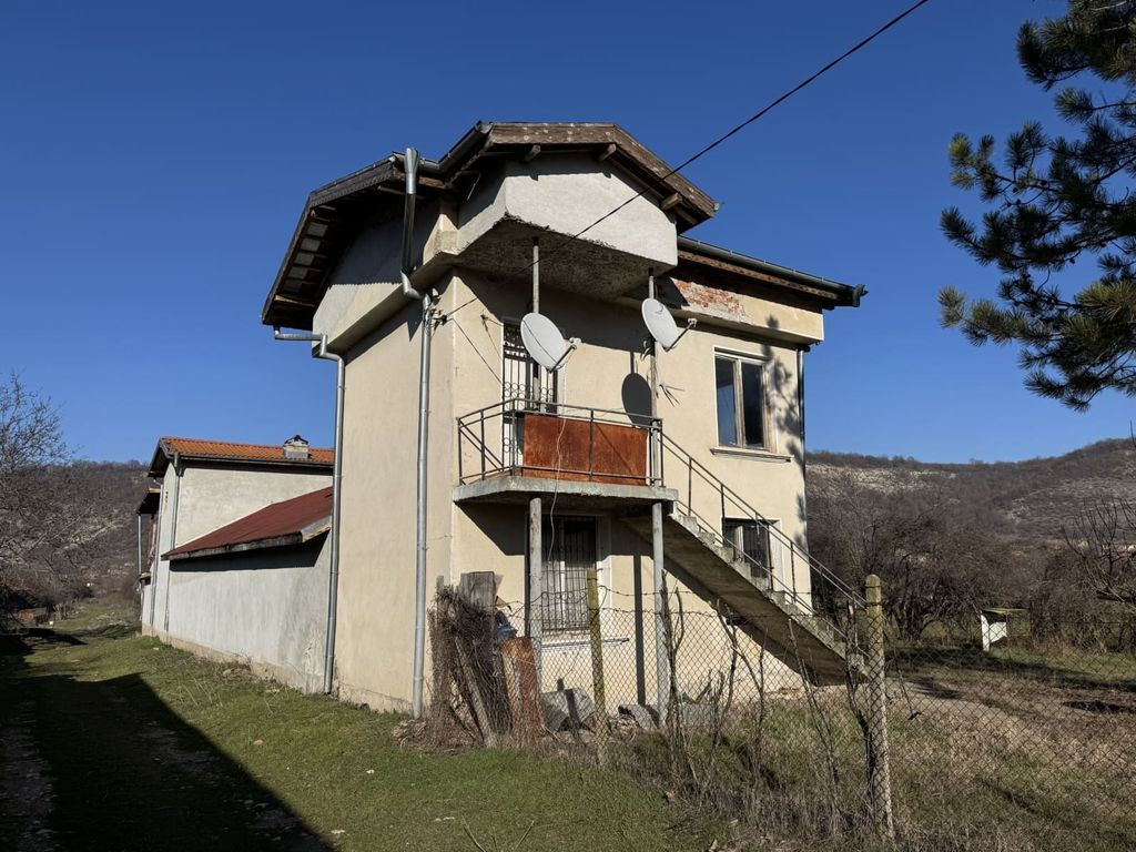 Property photo 2 of 49 Side Perspective Showing A Two-Storey Rural House With An External Concrete Staircase And Satellite Dishes Mounted On The Wall.