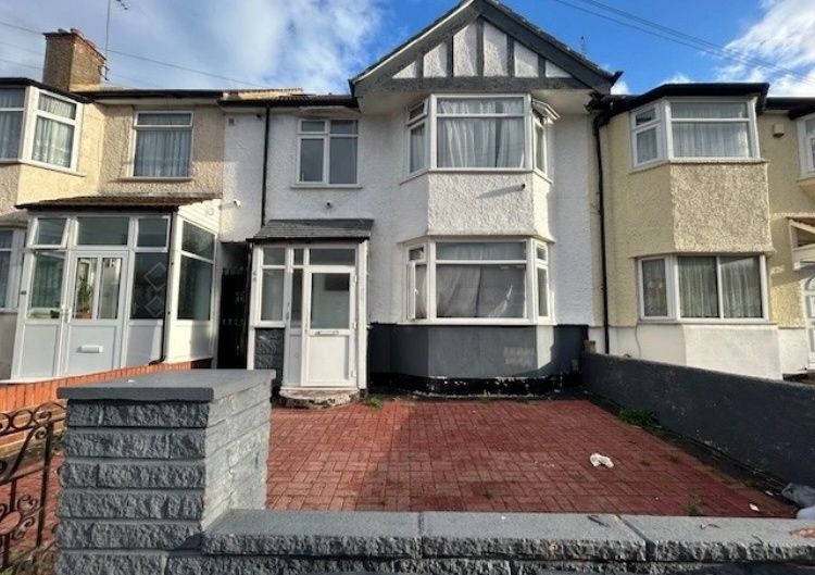 Property photo 1 of 6 Terraced Front Exterior With Paved Driveway And Co...