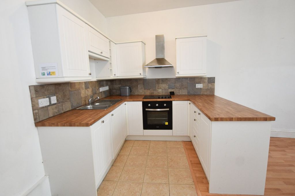 Property photo 3 of 8 Kitchen Area