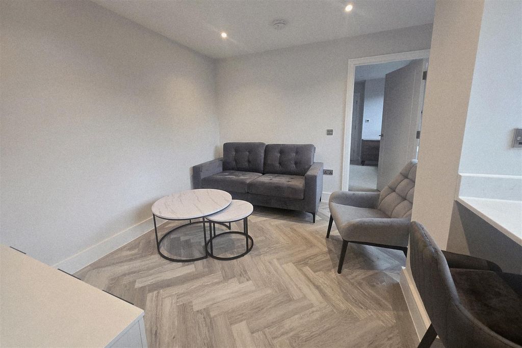 Property photo 3 of 15 Living Area