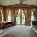 Property photo 2 of 6 Bright Lounge With Comfortable Seating And French Doors