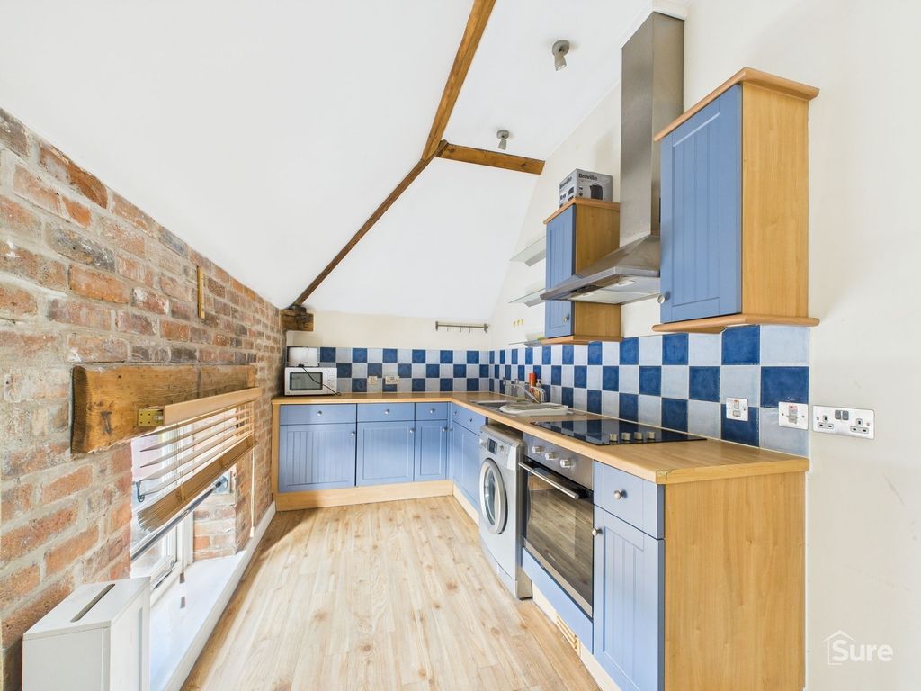 Property photo 3 of 8 Kitchen