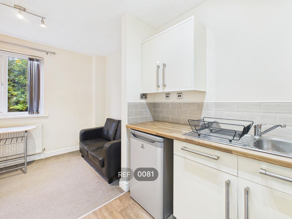 Property photo 3 of 20 Kitchen & Living Area