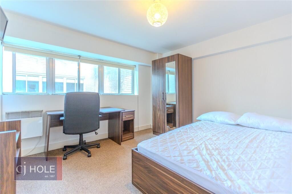 Property photo 3 of 12 Bright And Tidy Double Bedroom Featuring A Large W...