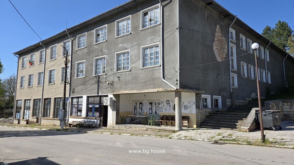 Property photo 1 of 28 Front And Side View Of A Three-Storey Commercial Building With A Covered Porch And Multiple Windows In Village Goritsa