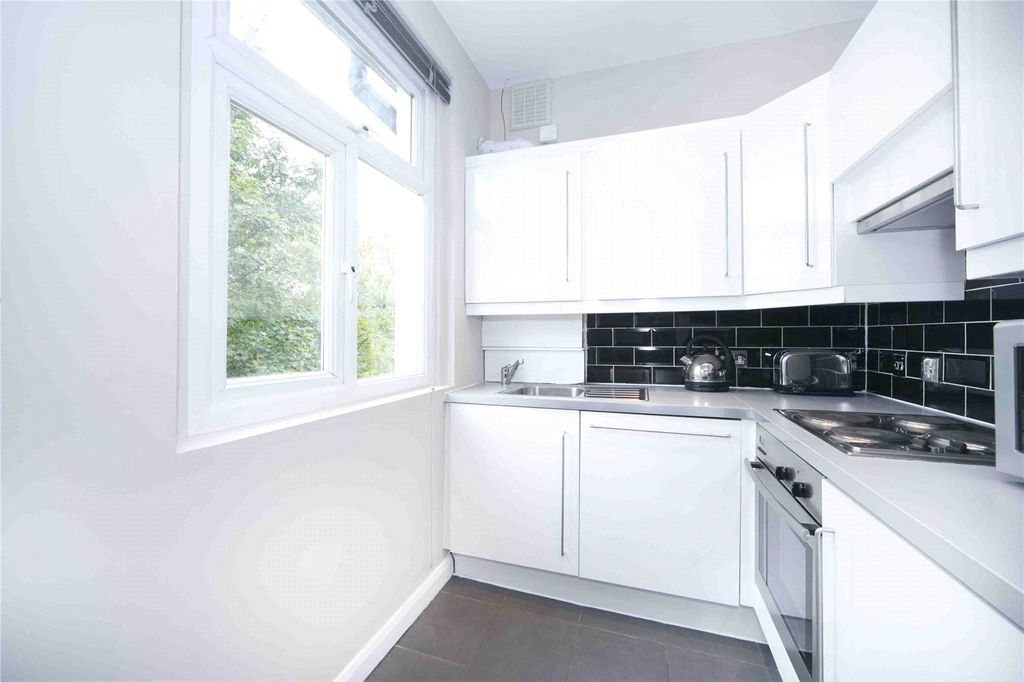 Property photo 3 of 8 Kitchen