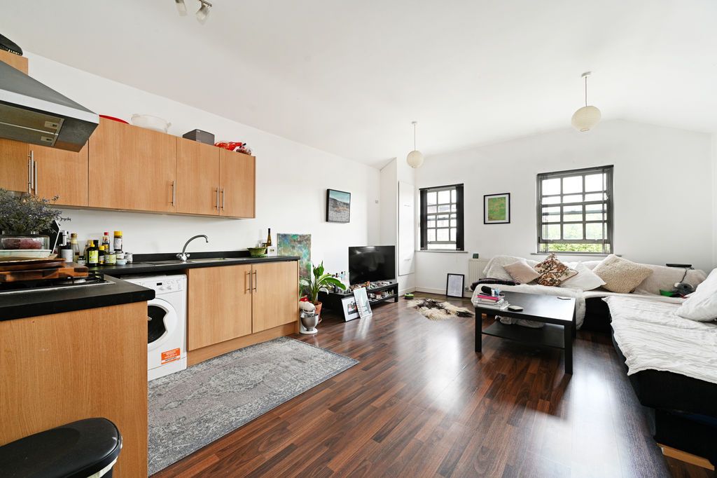 Property photo 1 of 12 Kitchen/Living Area