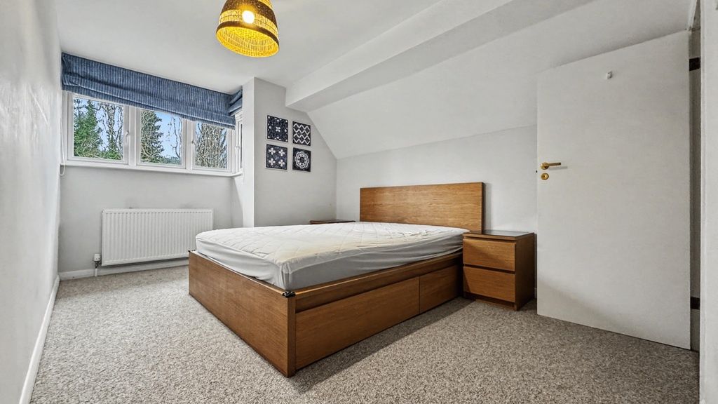Property photo 2 of 12 Bright, Simply Styled Double Bedroom With A Wooden...