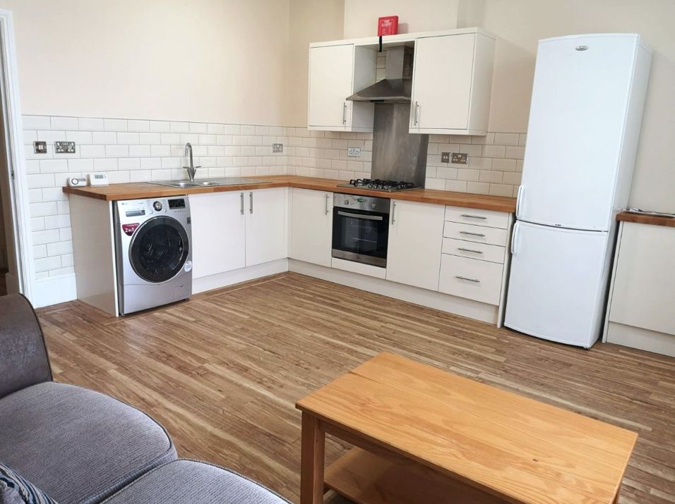 Property photo 2 of 5 Bright And Modern Kitchen With Ample Countertop Sp...