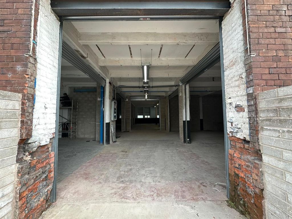 Property photo 2 of 7 Building-Foyer.Jpeg