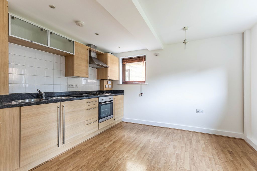 Property photo 3 of 12 Kitchen