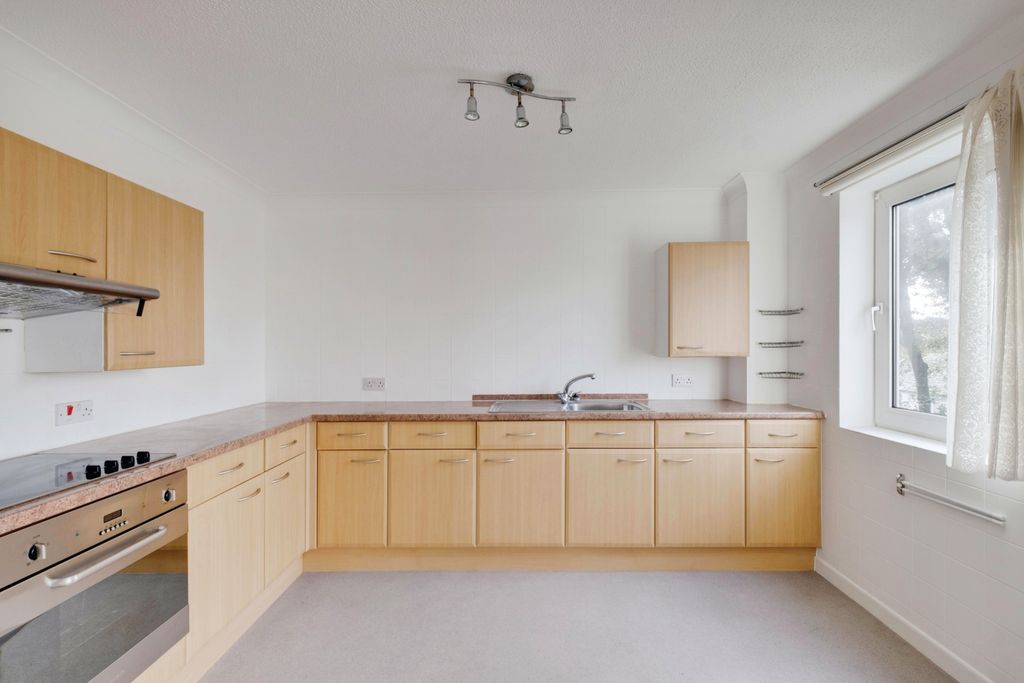 Property photo 3 of 12 Kitchen