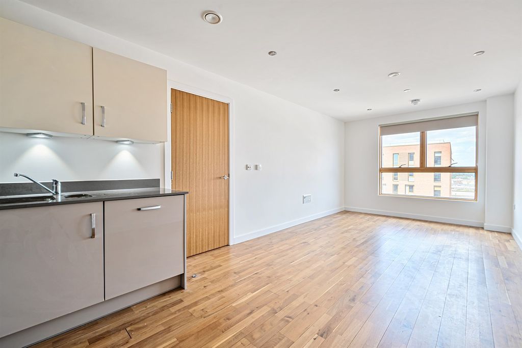 Property photo 3 of 9 Living Area