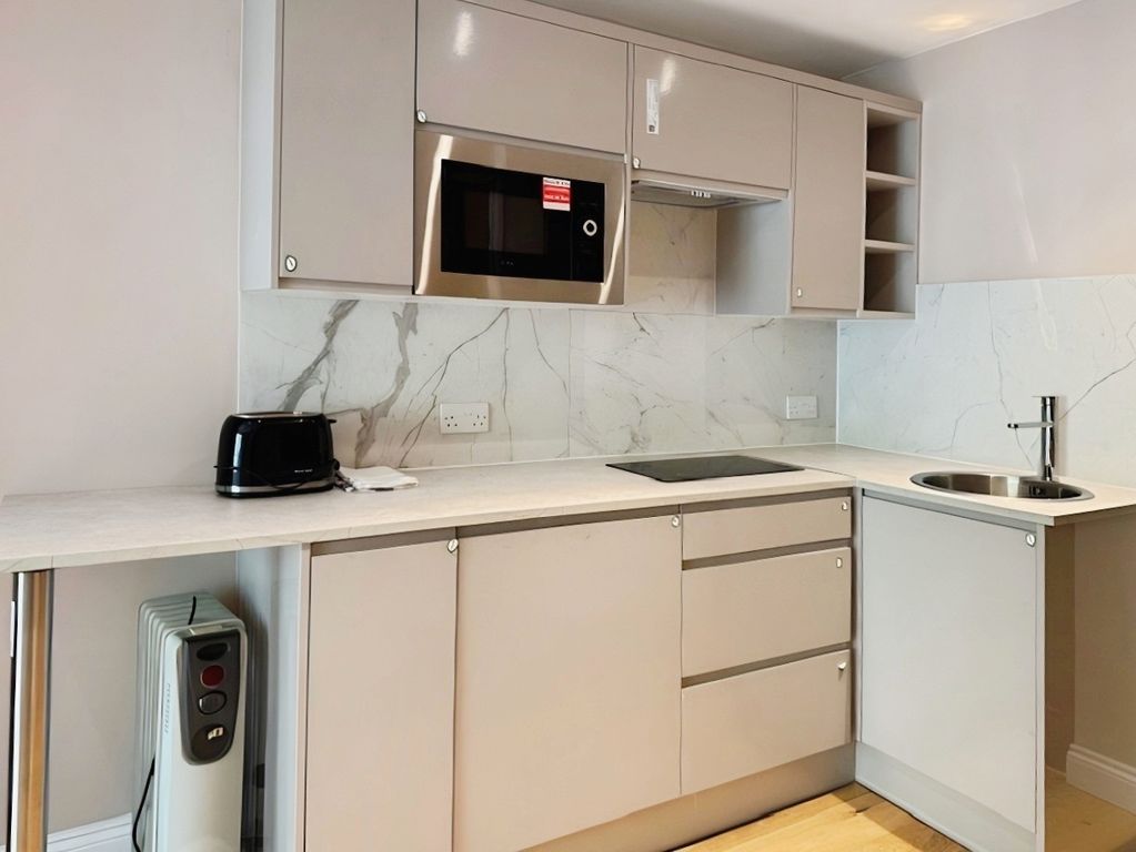 Property photo 2 of 9 Kitchen Area