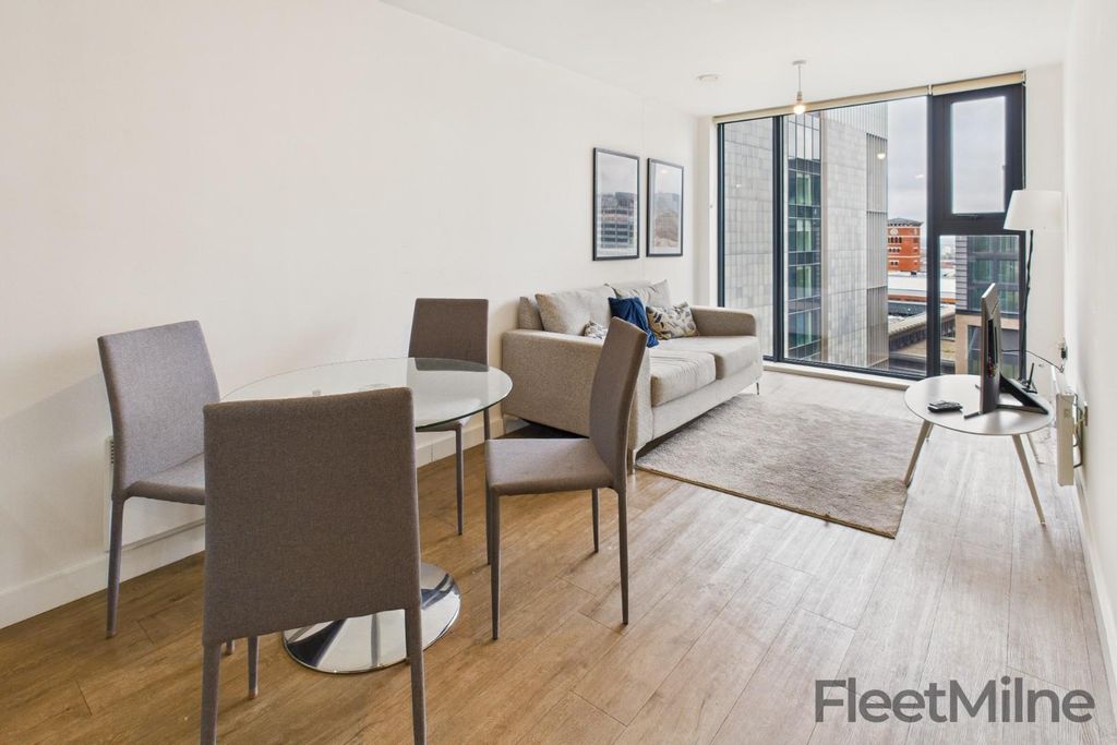 Property photo 1 of 8 Living Area