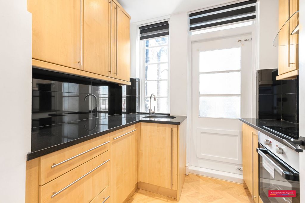 Property photo 3 of 17 Kitchen