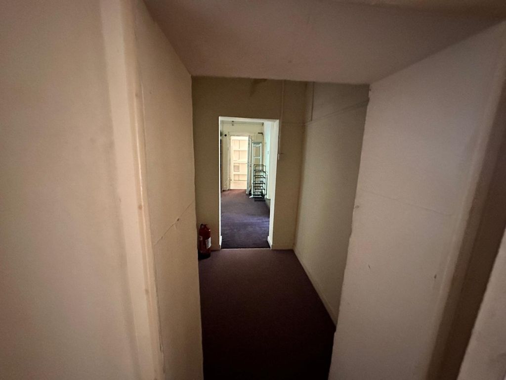 Property photo 1 of 17 A Spacious Hallway Leading To Various Rooms, Offer...