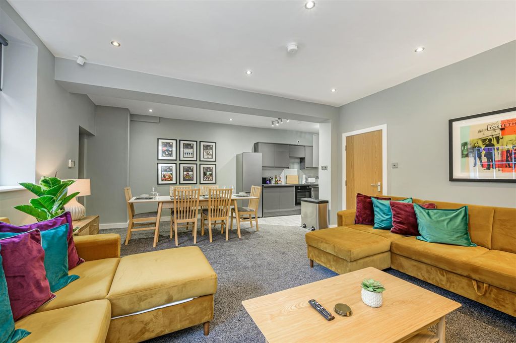 Property photo 3 of 12 Living/Dining Area