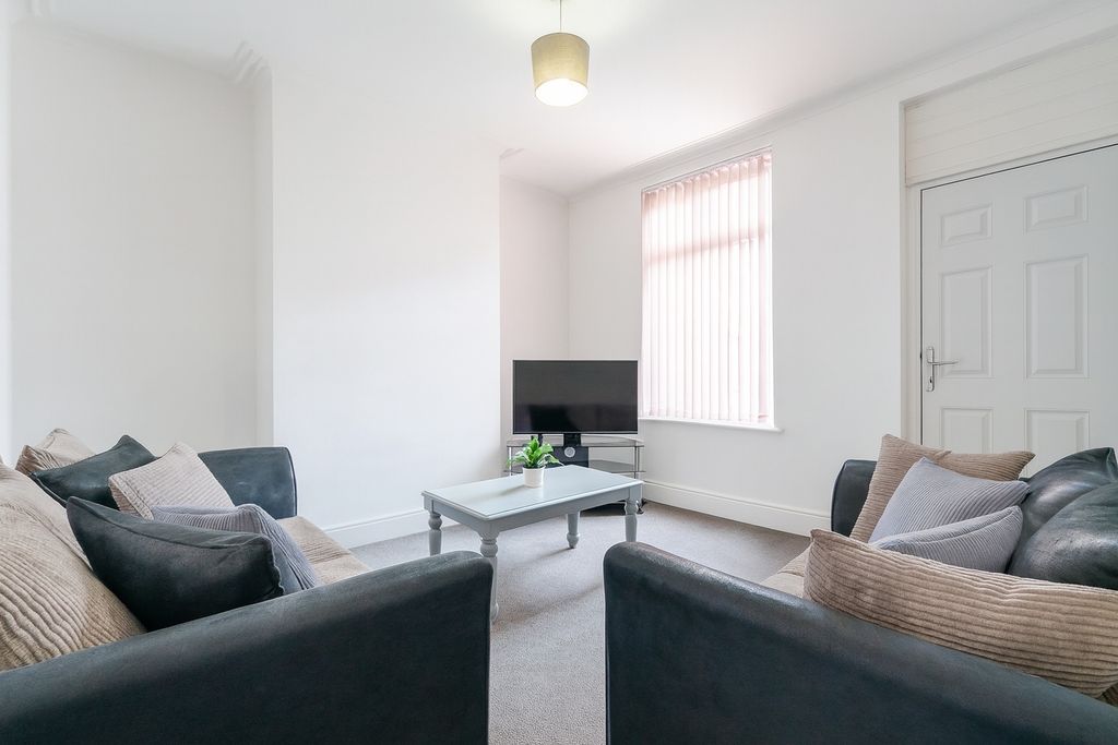 Property photo 2 of 6 A Bright, Well-Maintained Living Room Featuring Co...