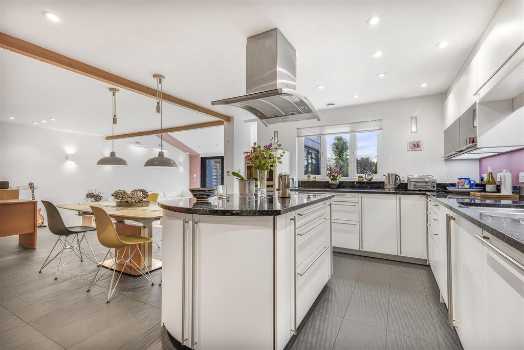 Property photo 2 of 26 Kitchen/Dining/Family Room