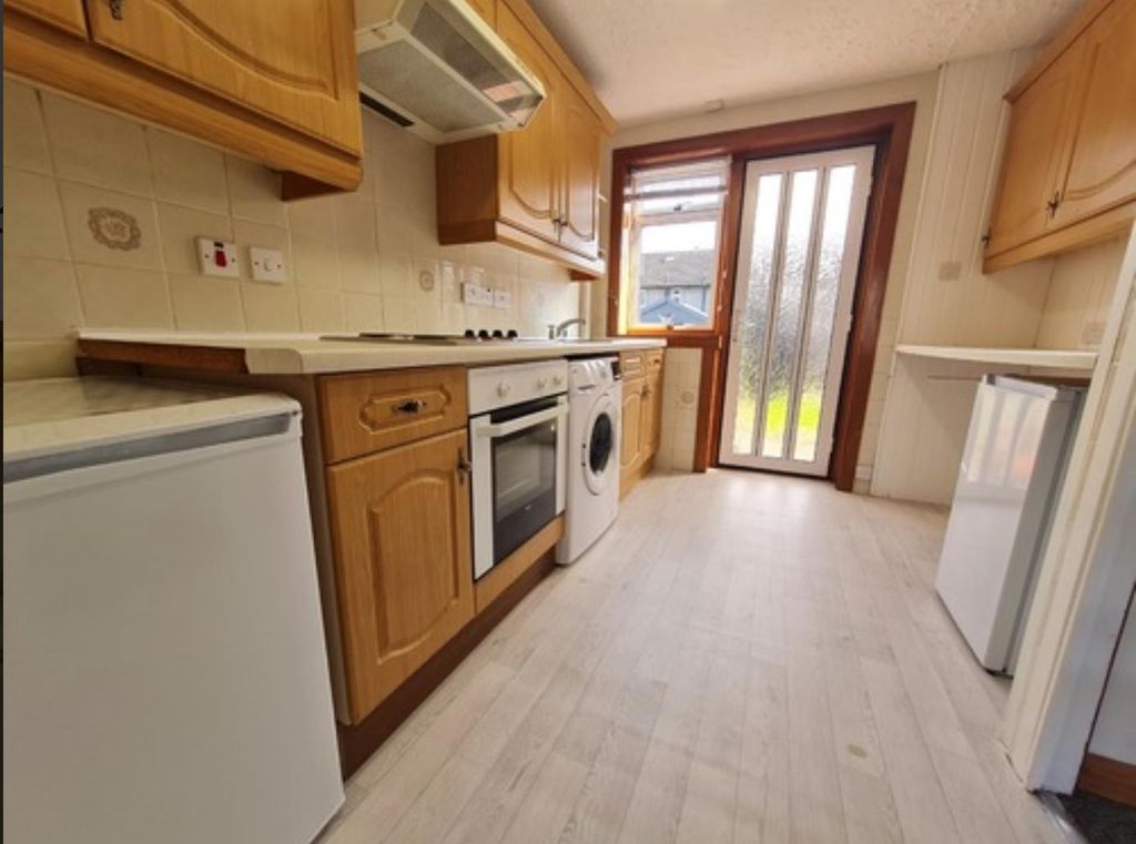 Property photo 3 of 6 Kitchen