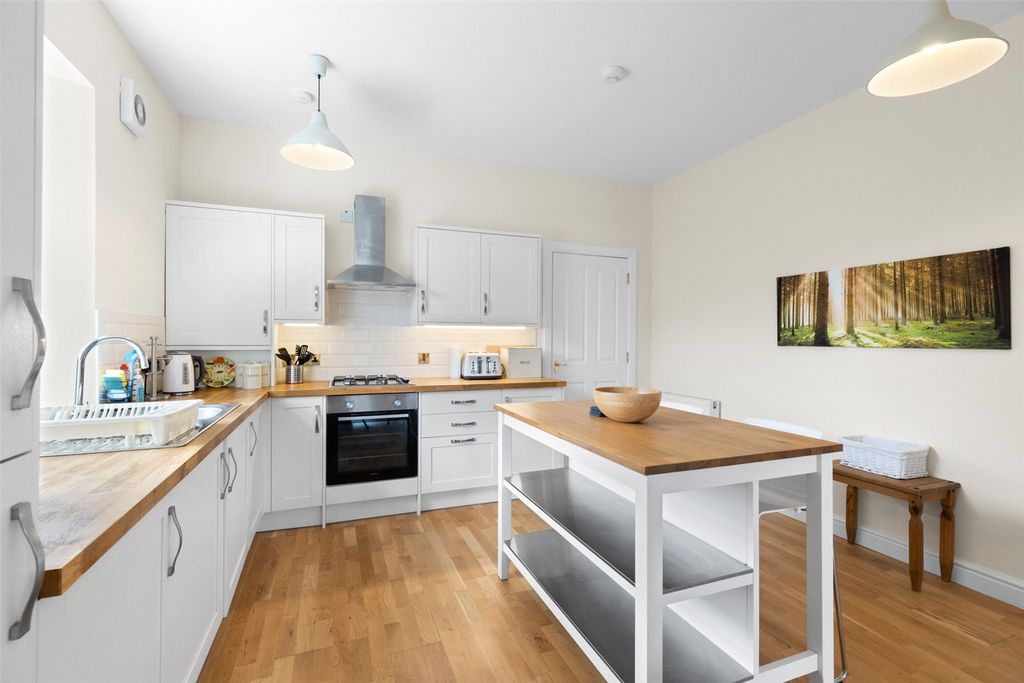 Property photo 3 of 13 Kitchen