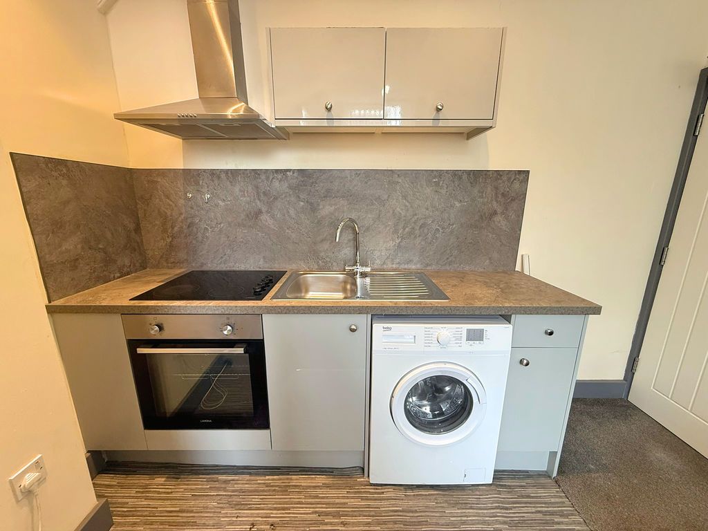 Property photo 3 of 4 Kitchen