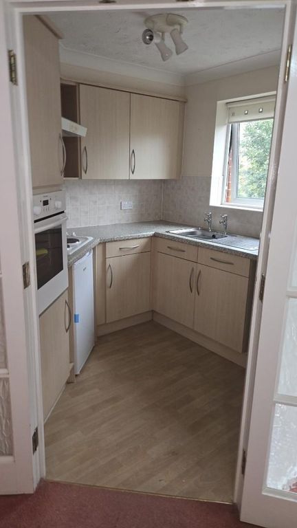 Property photo 3 of 12 Kitchen