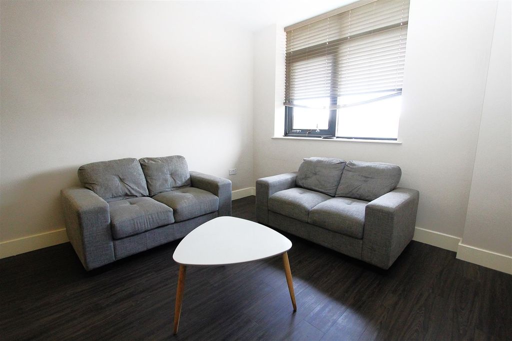 Property photo 2 of 9 Bright Lounge With Modern Sofas And Coffee Table...