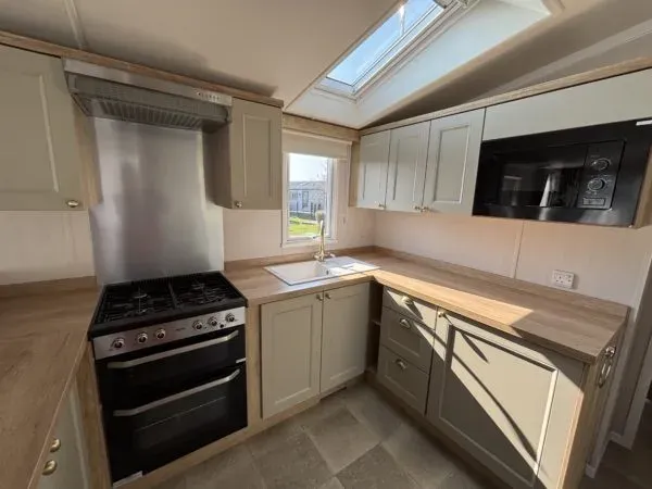 Property photo 3 of 7 Swift Provence Kitchen Area At The Springs Holiday Park
