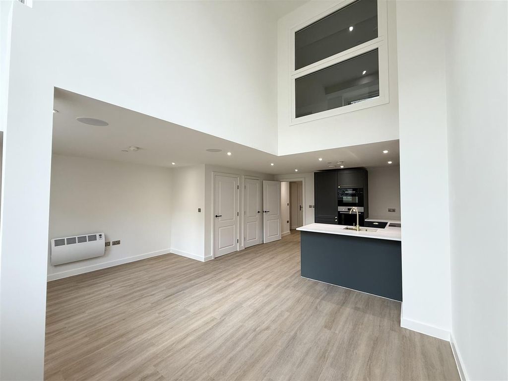 Property photo 2 of 8 Bright Open-Plan Living With Soaring Ceilings....