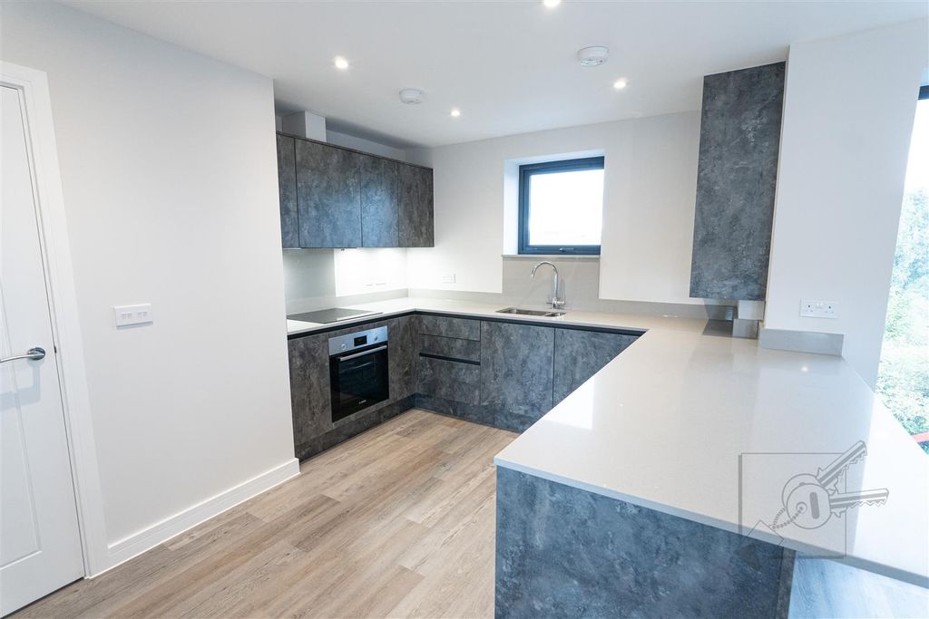 Property photo 3 of 16 Kitchen