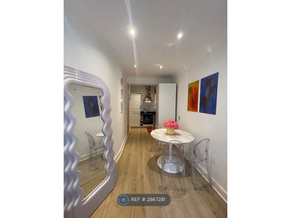 Property photo 2 of 7 Dining Area With Kitchen In The Background
