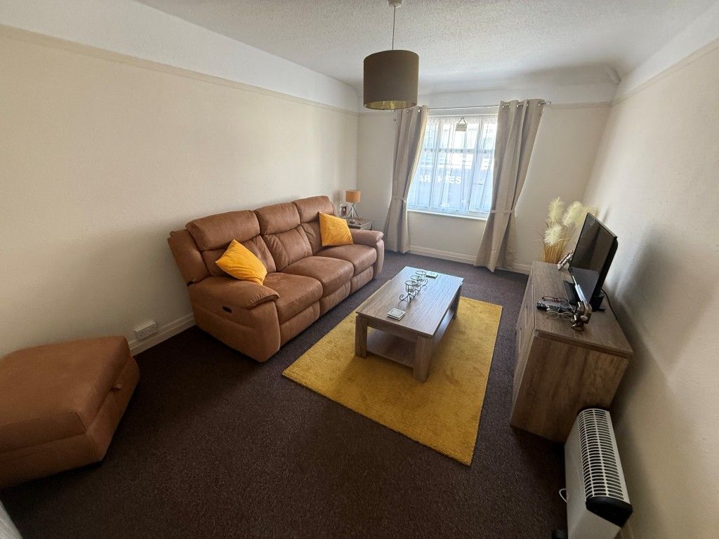 Property photo 3 of 12 Living Room