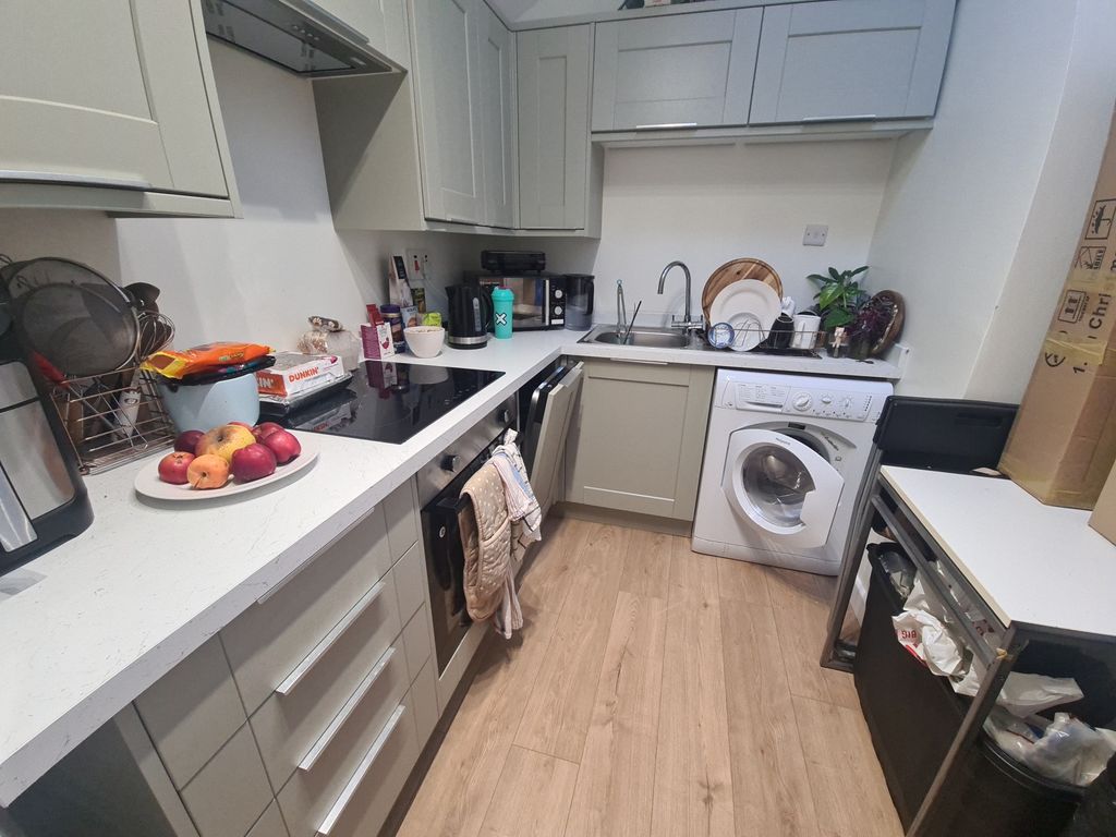 Property photo 2 of 6 Bright, Modern Kitchen With Light Cabinets, Integr...