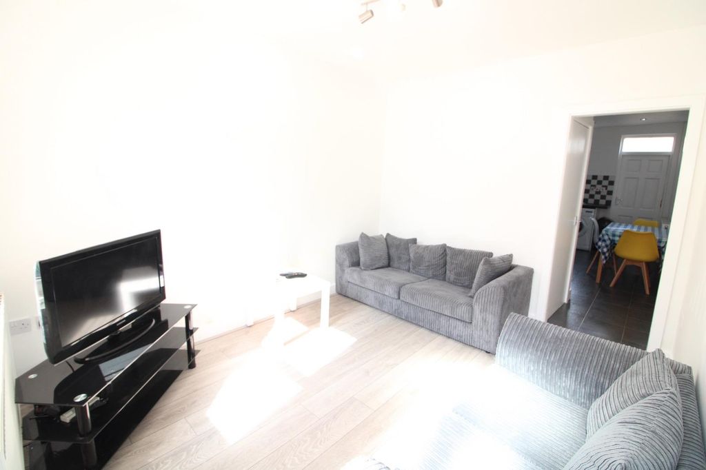 Property photo 3 of 12 Living Area