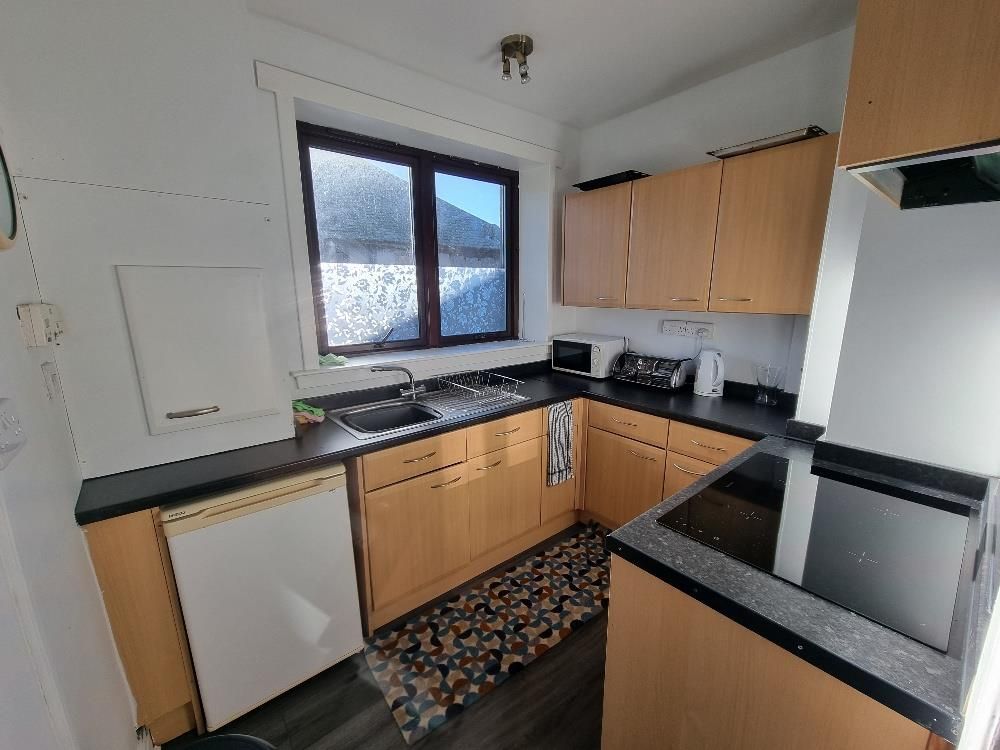 Property photo 3 of 9 Kitchen