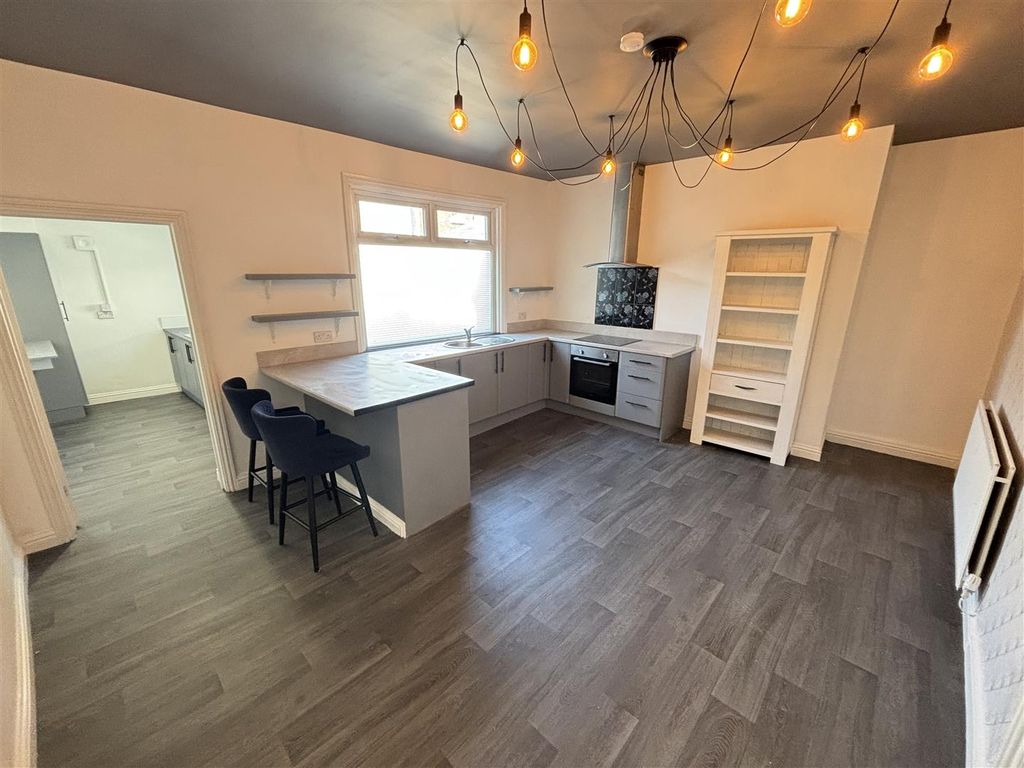 Property photo 2 of 12 Kitchen And Dining Room