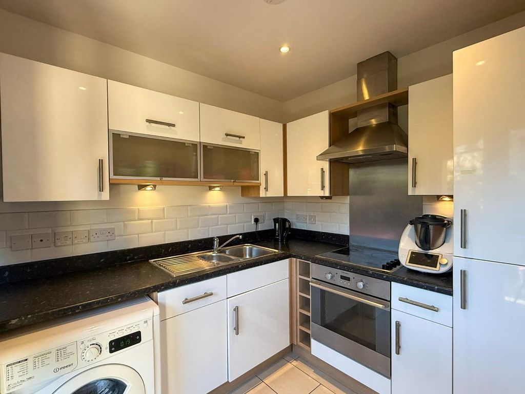 Property photo 2 of 12 Kitchen