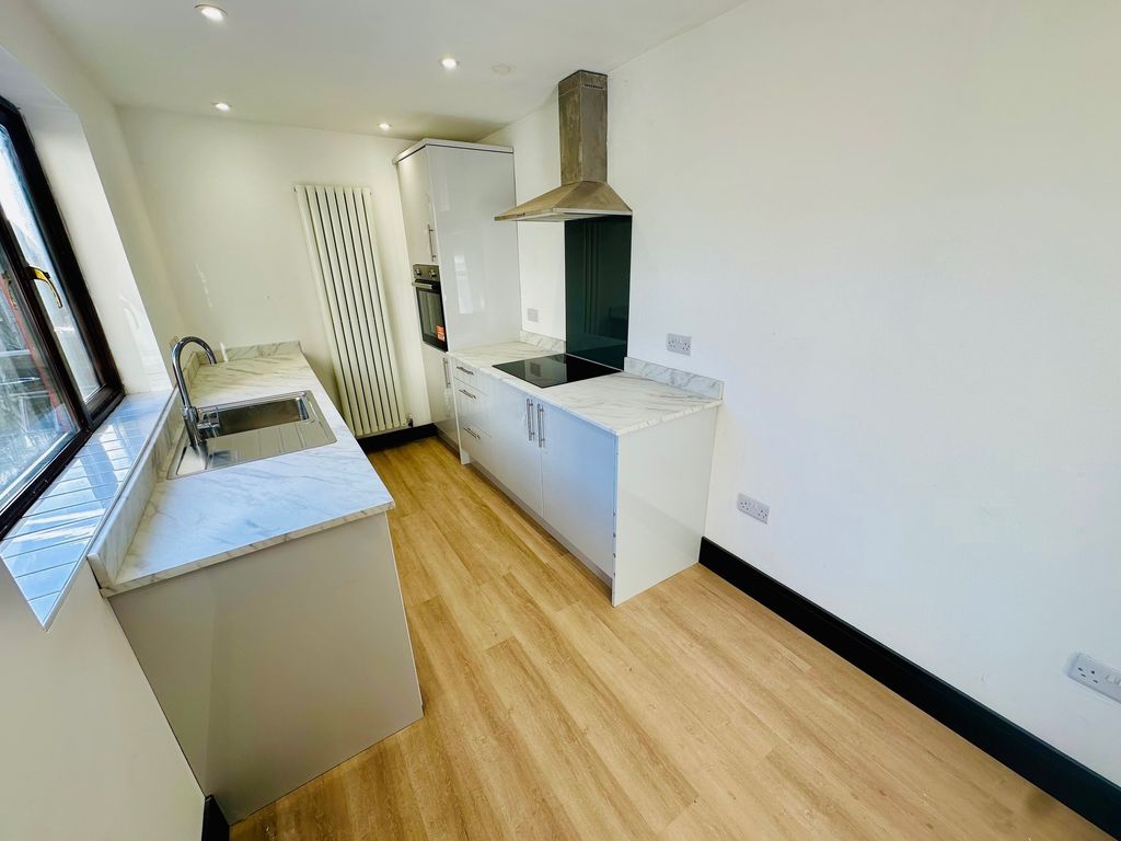 Property photo 3 of 13 Kitchen