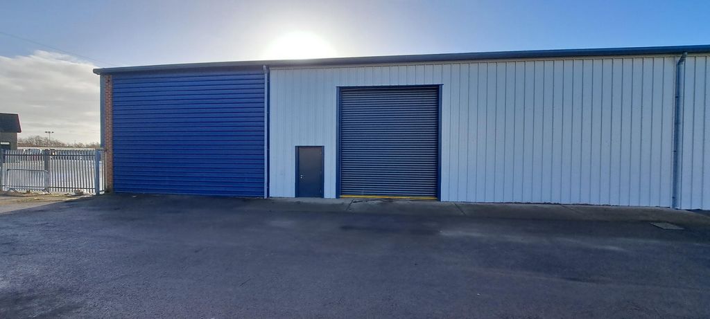 Property photo 2 of 7 Unit 8 Side