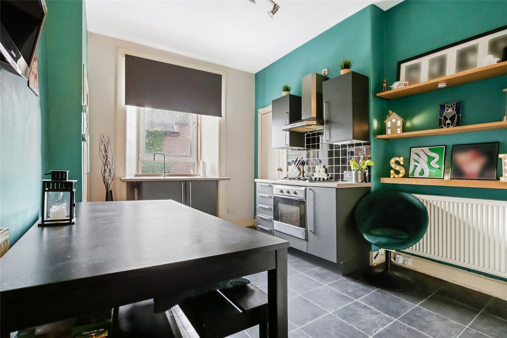 Property photo 3 of 16 Dining Kitchen