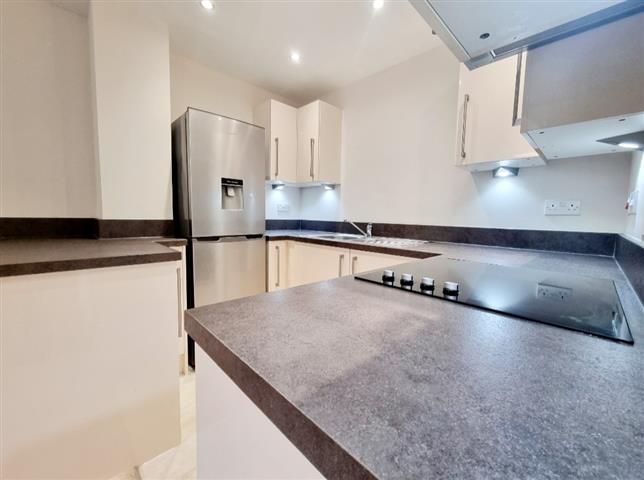 Property photo 3 of 13 Kitchen