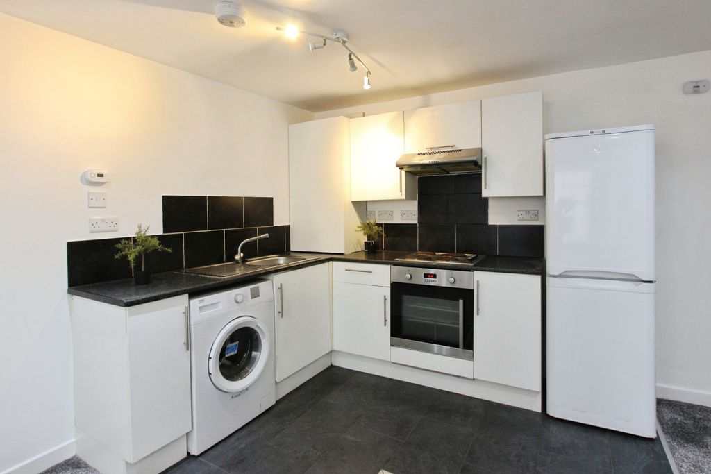Property photo 1 of 9 Kitchen Area