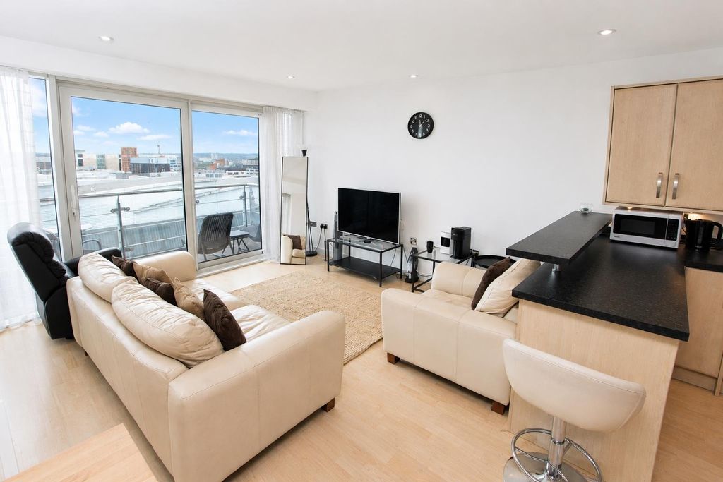Property photo 1 of 9 Bright Open-Plan Living Area With Balcony Views...