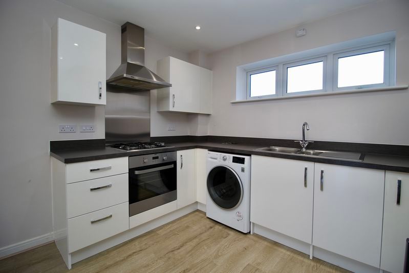 Property photo 3 of 12 Kitchen