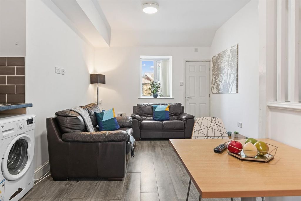 Property photo 3 of 14 Bright, Modern Living Area With Two Comfortable So...