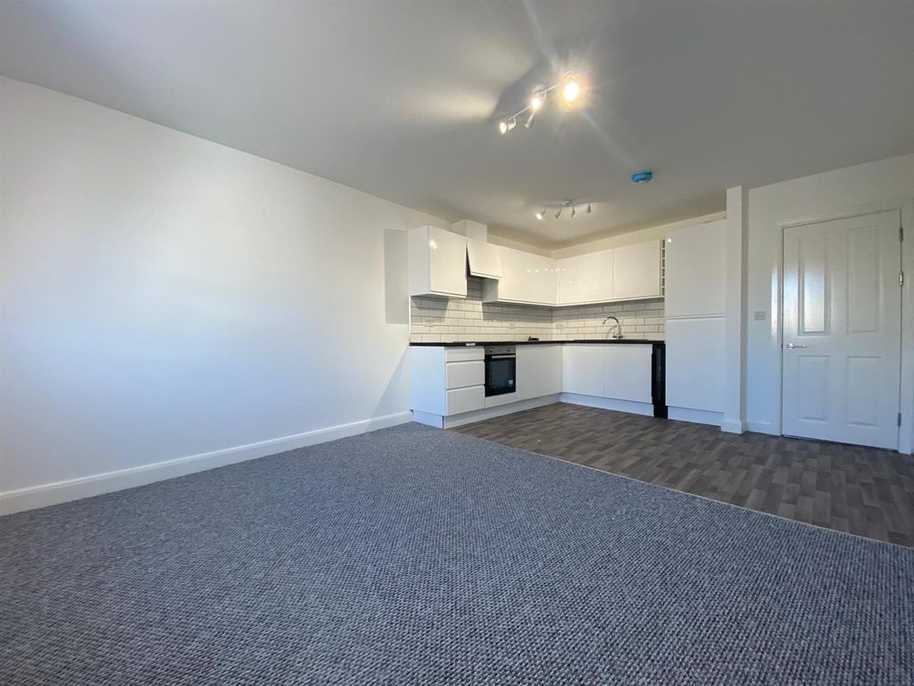 Property photo 1 of 7 Living Area