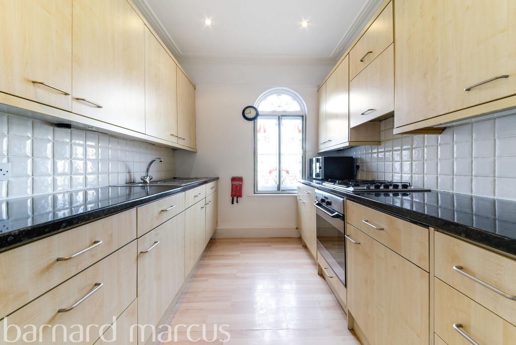 Property photo 2 of 8 Kitchen