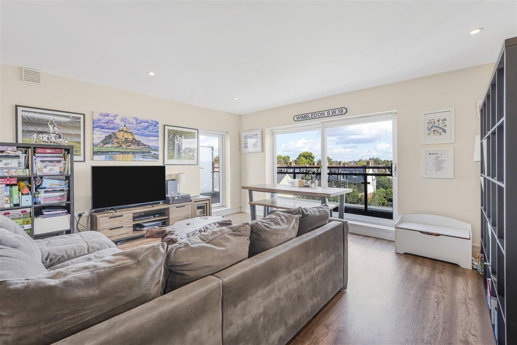 Property photo 1 of 12 Living Area